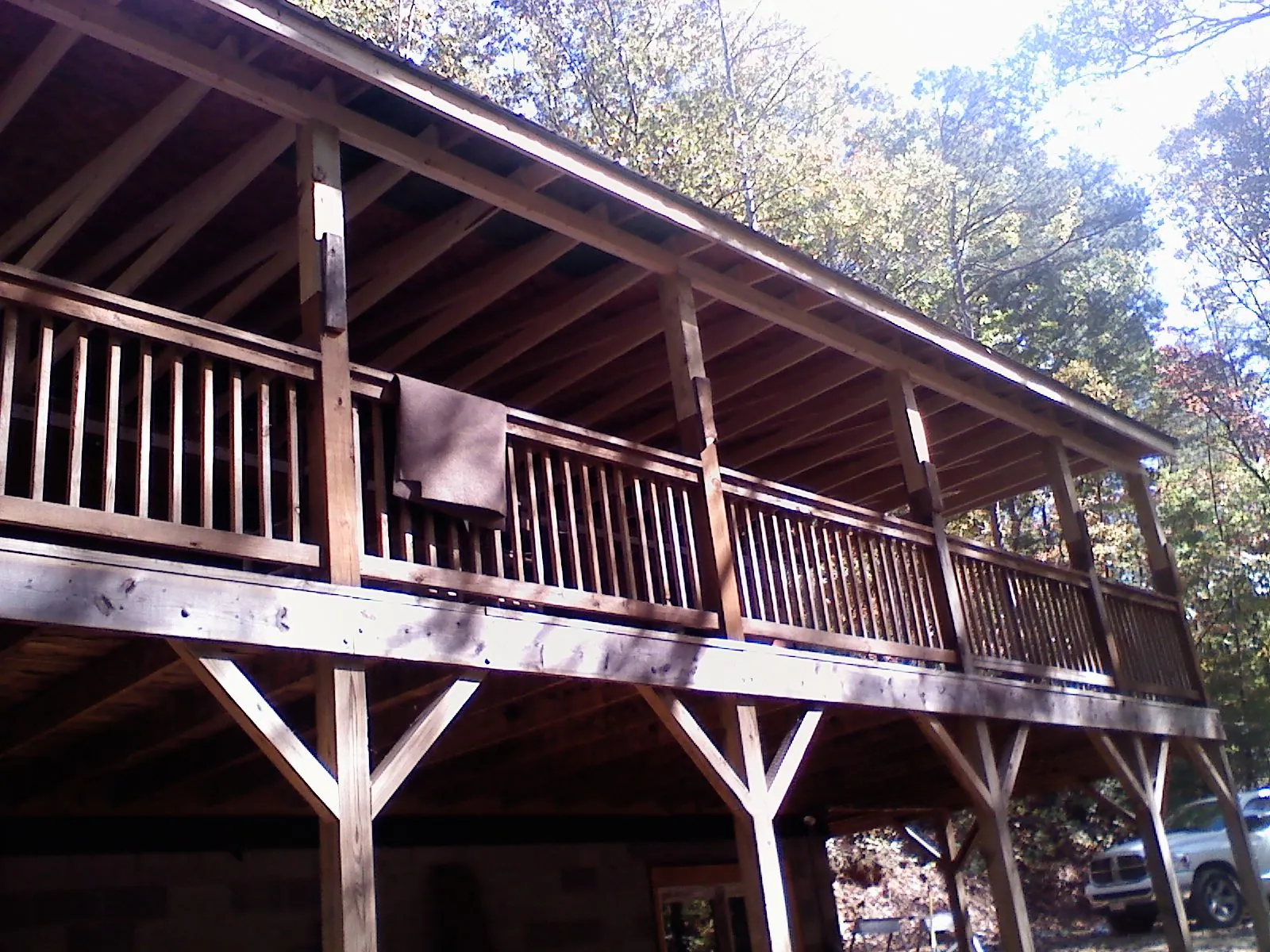 Timber framing under a new elevated porch and deck — Roof Leak Repair in Hilltown by Roofing Brothers